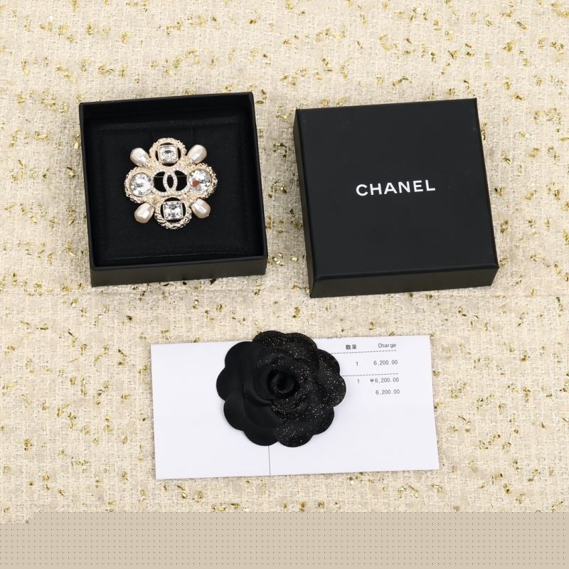 Ch*el brooches